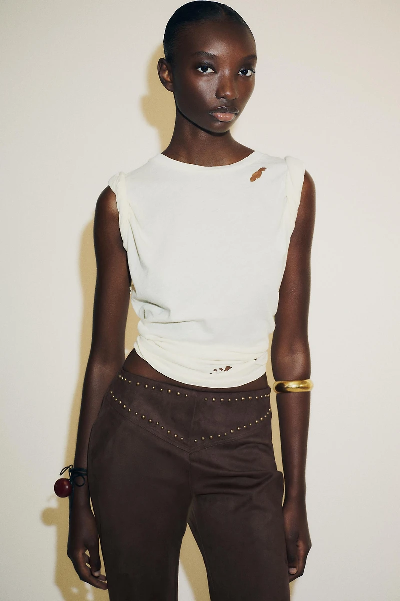 FAUX SUEDE STUDDED FLARE PANTS