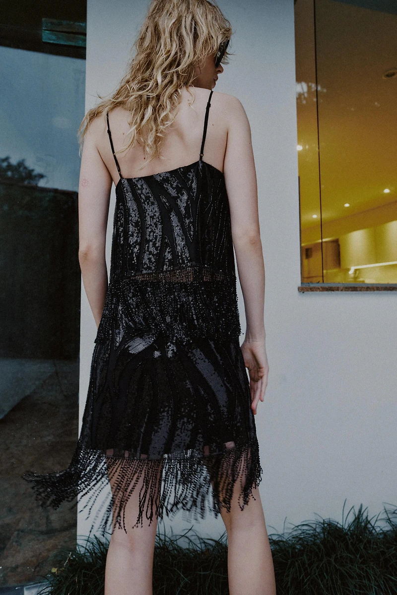 FRINGED SEQUIN TOP