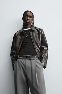 PANTALON BALLON AVEC PLIS ET CEINTURE