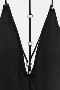 STRAPPY SWIMSUIT WITH EYELETS