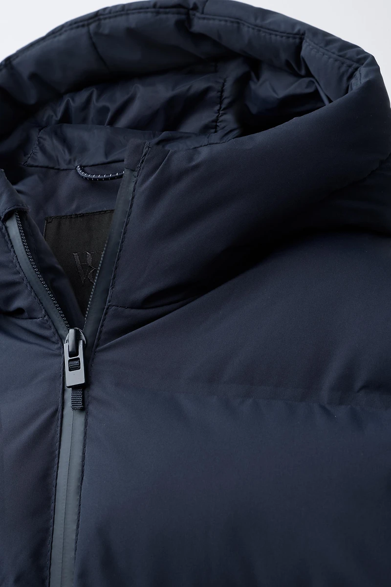MANTEAU MATELASSÉ ÉTIQUETTE WATER REPELLENT