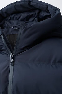 MANTEAU MATELASSÉ ÉTIQUETTE WATER REPELLENT