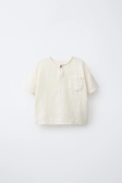 T-SHIRT EN MATIÈRES VARIÉES AVEC POCHE