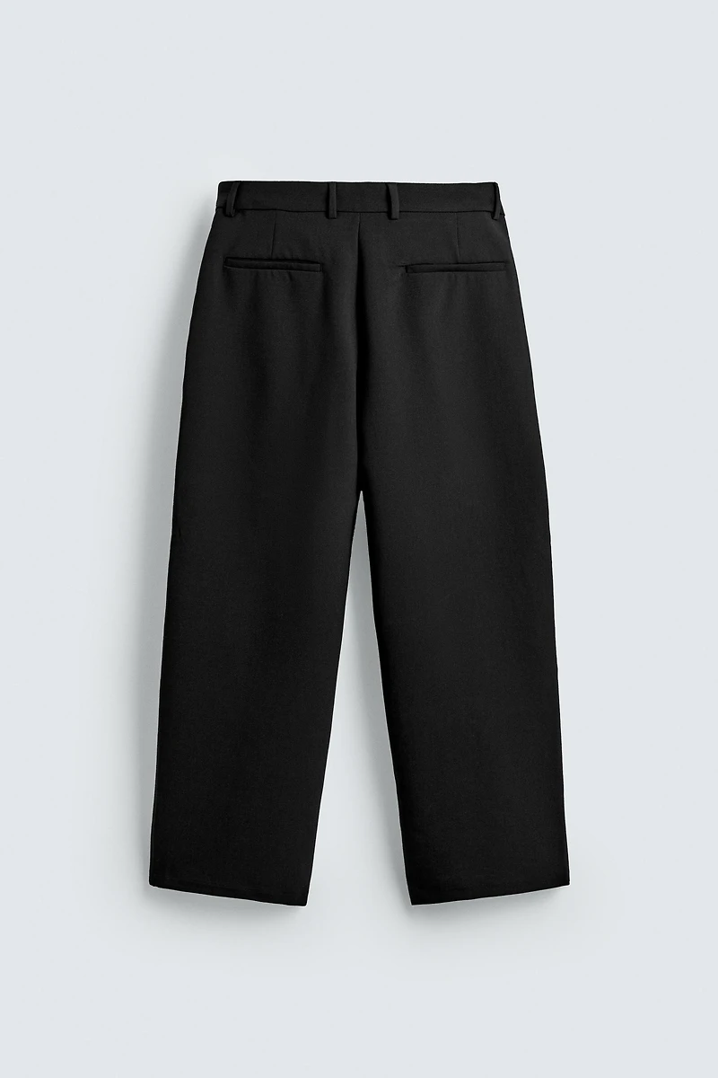RELAXED FIT PLEATED PANTS