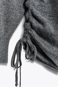 TIE KNIT SWEATER