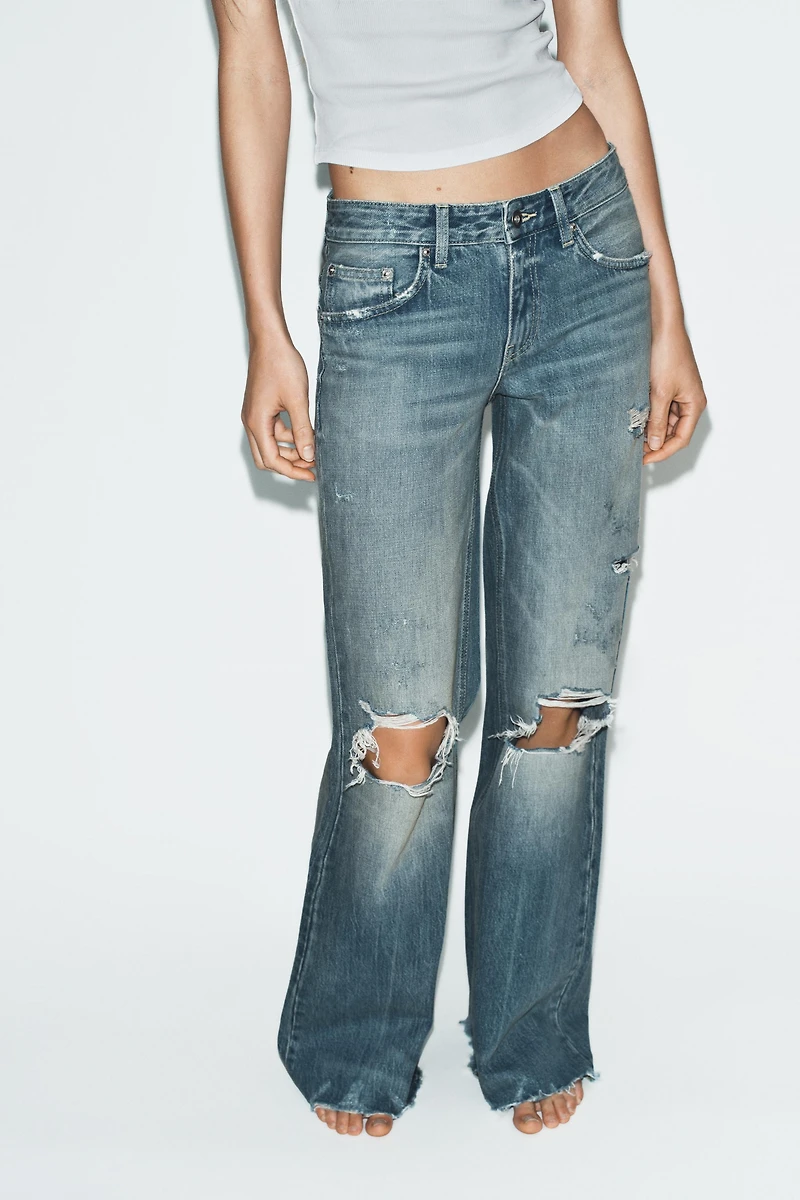 TRF FLARE RIPPED MID-RISE JEANS