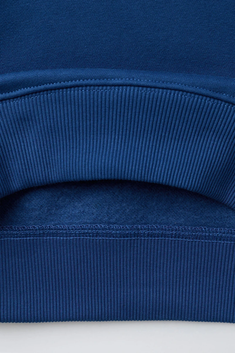 EMBROIDERED POCKET SWEATSHIRT