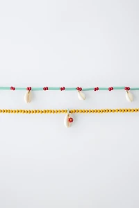 PACK OF TWO BEADED SHELL NECKLACES