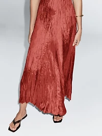 Robe longue plissée satinée