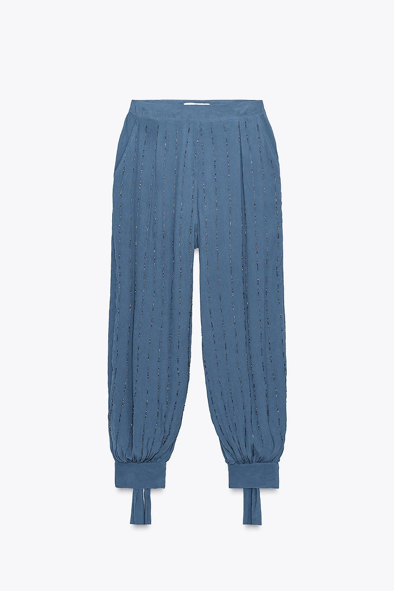 BEADED PANTS WITH TIED HEMS