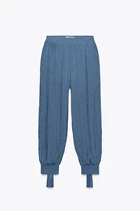 BEADED PANTS WITH TIED HEMS