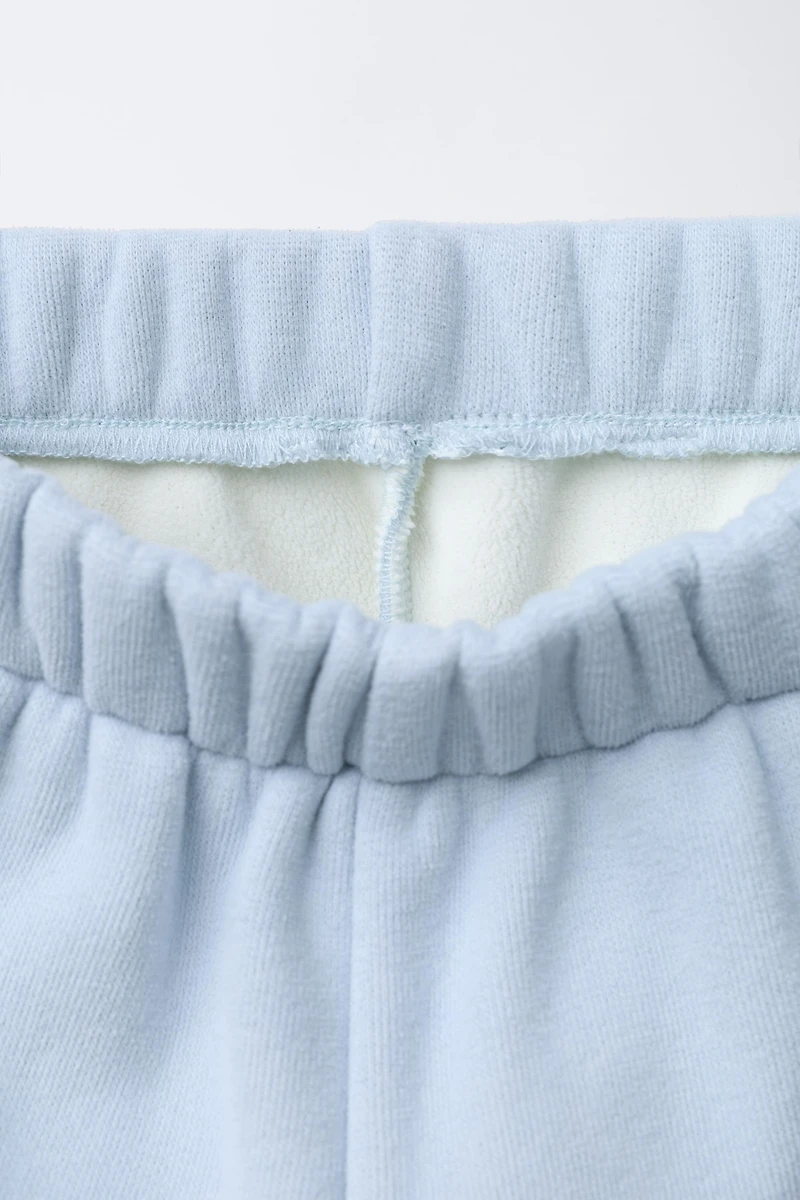 FLEECE LINED BAGGY PANTS WITH LOGO