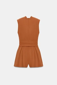 BELTED SHOULDER PAD JUMPSUIT