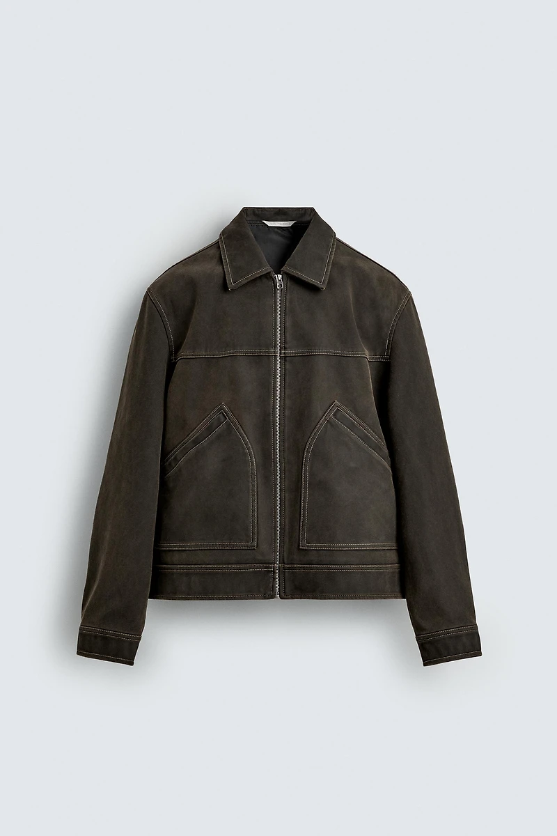 BLOUSON EFFET DÉLAVÉ SURPIQÛRES