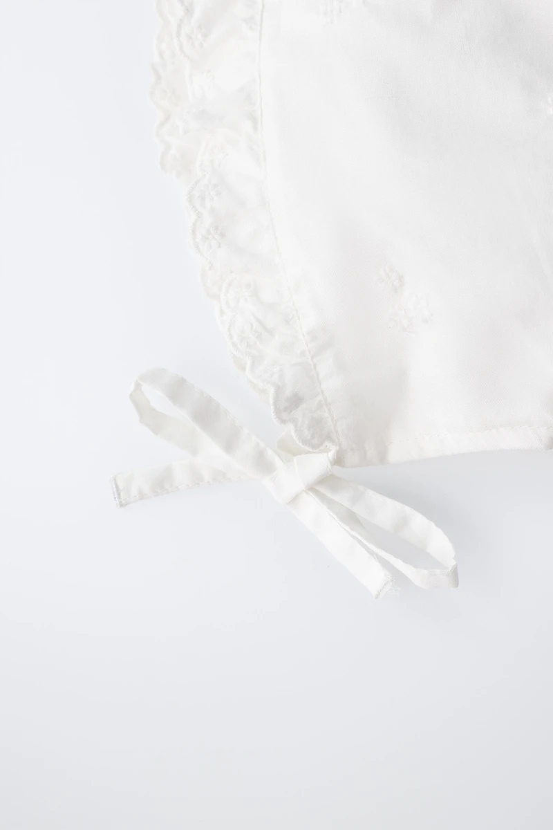 EMBROIDERED RUFFLE BONNET