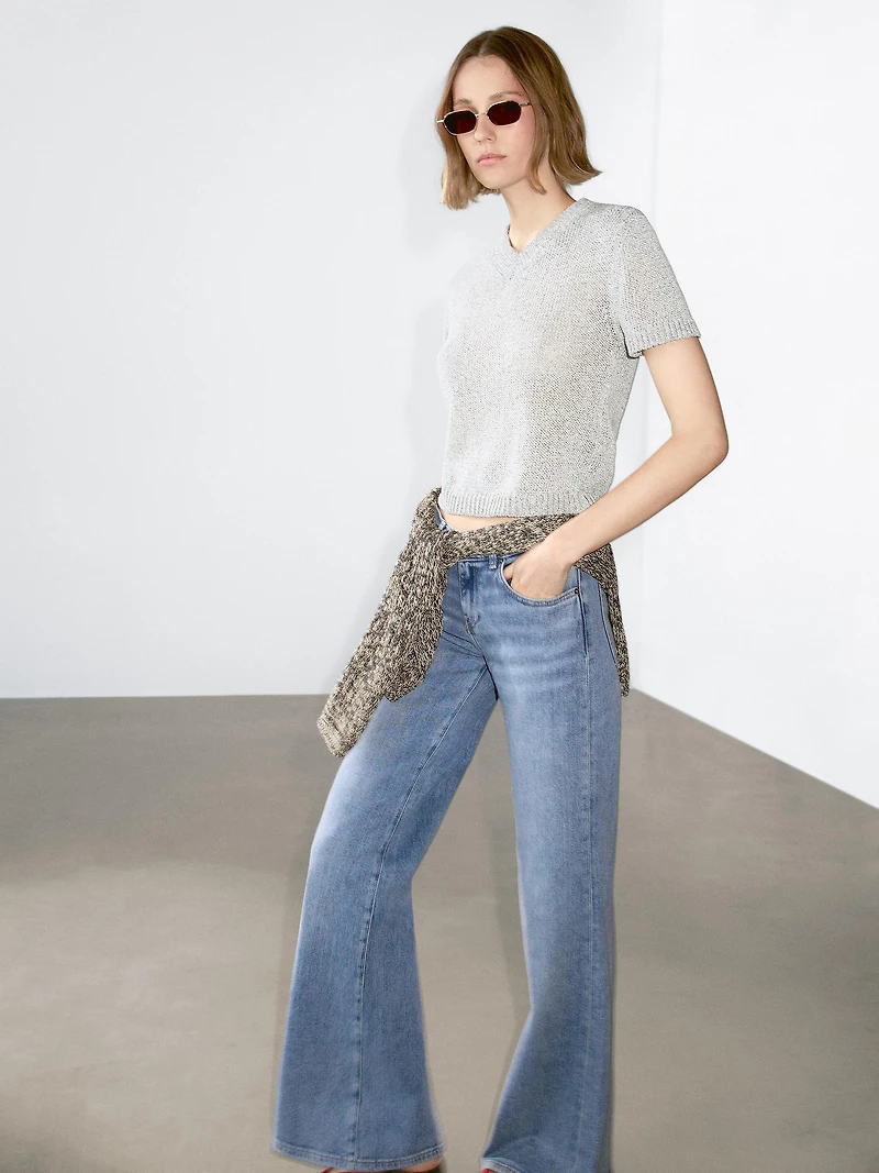 Knit sweater with fabric detail