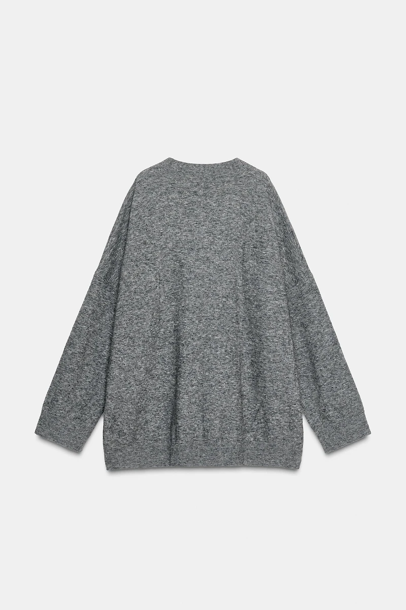 PULL OVERSIZE AVEC LAINE