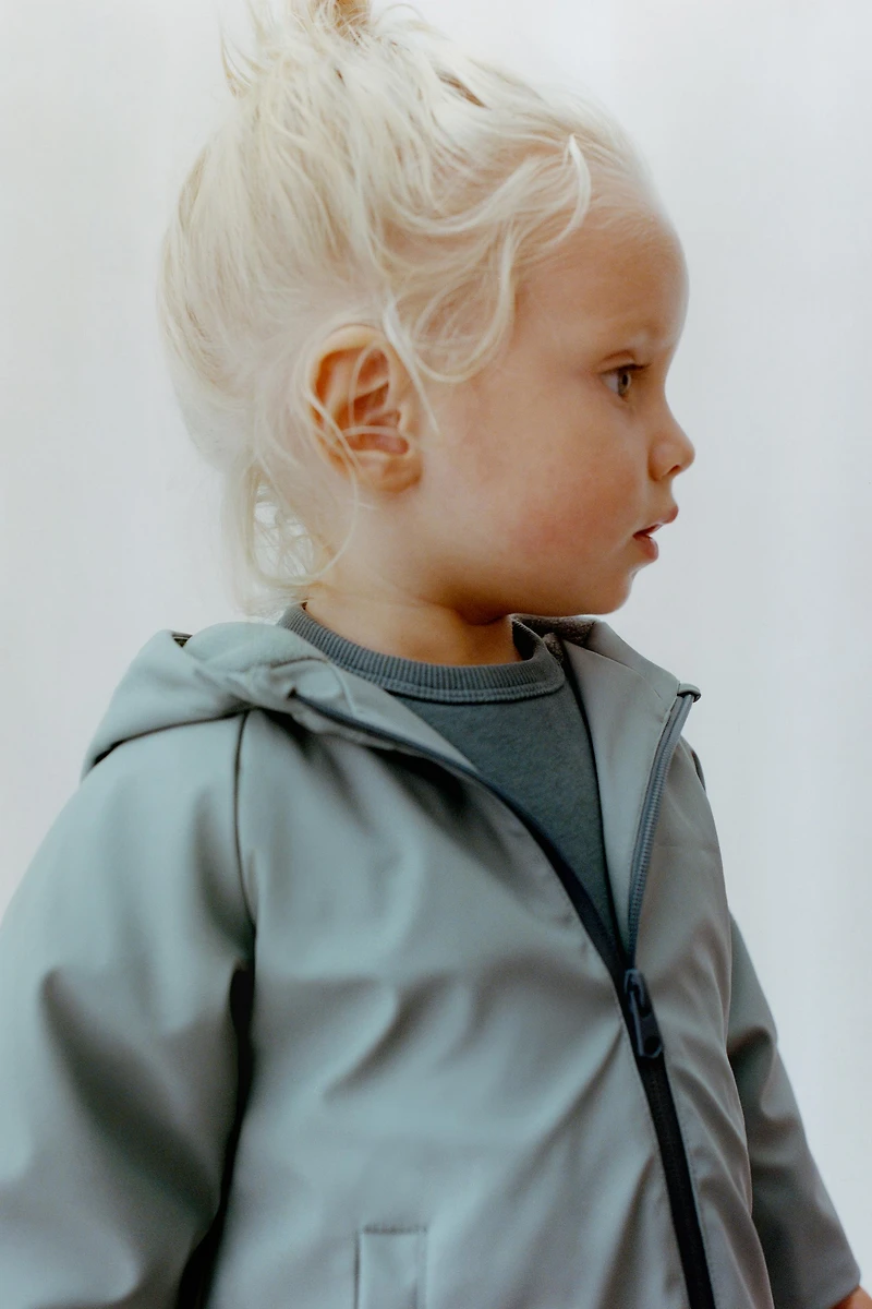 BLOUSON GOMMÉ DÉPERLANT