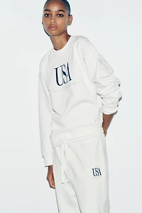 COTTON TEXT PANTS