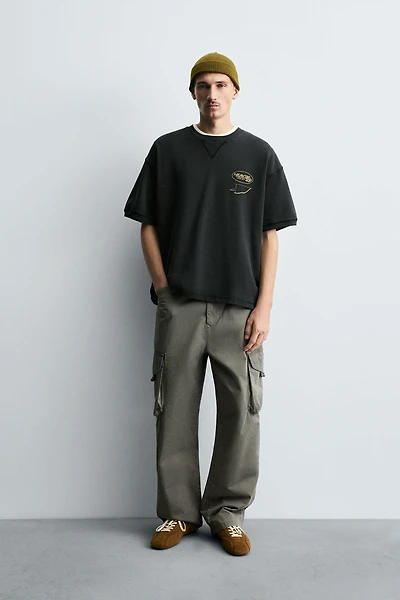 WASHED PRINTED GRAPHIC SWEATSHIRT