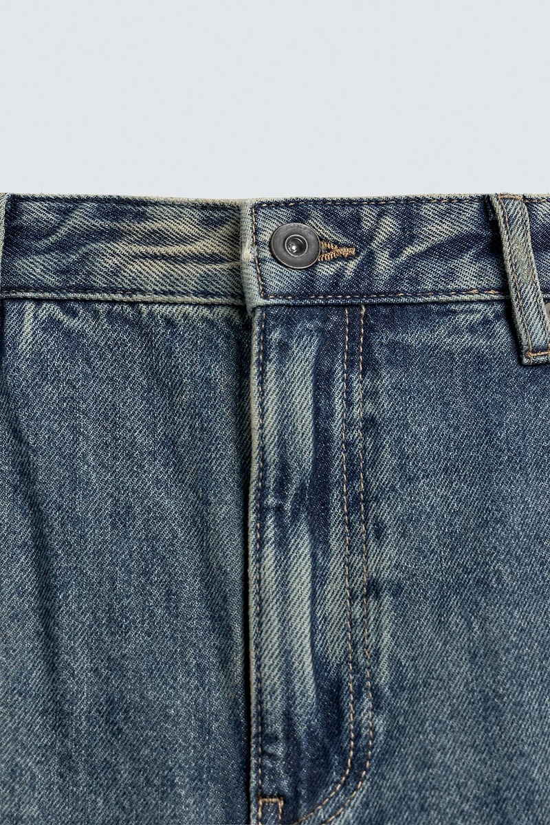 JEAN FLARE FIT DÉLAVÉ TACHES