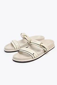 FLAT BUCKLED SANDALS