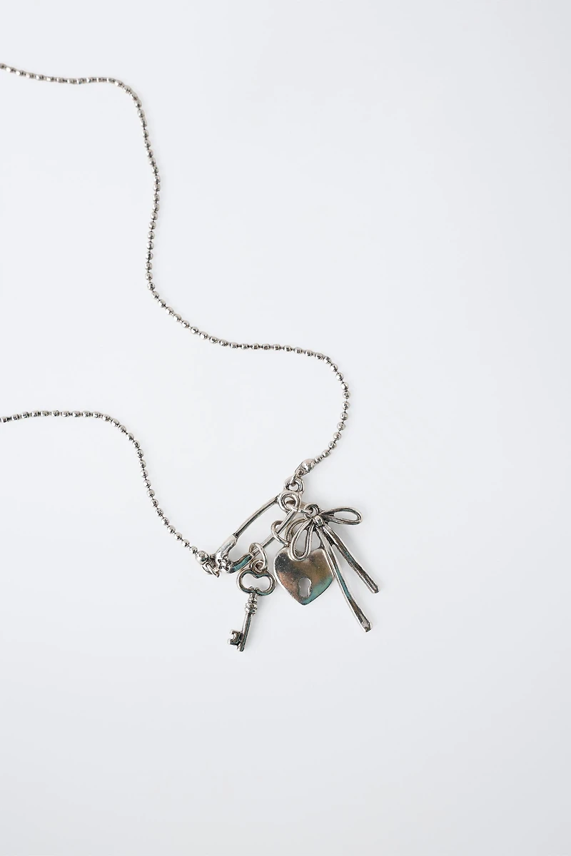 KEY, BOW, AND PADLOCK CHARM NECKLACE