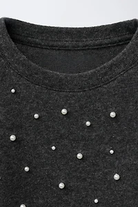 HAUT SOFT TOUCH À PERLES