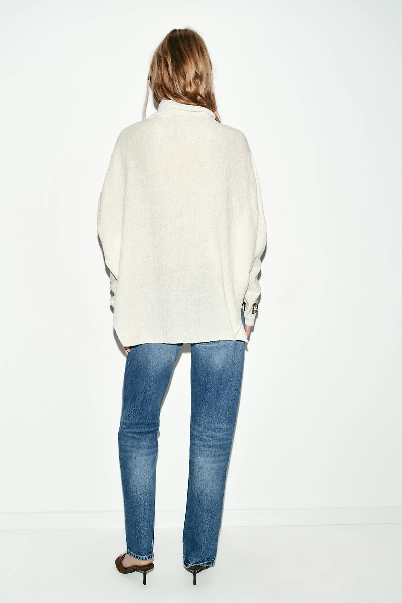 PULL CAPE EN MAILLE