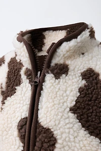 VESTE EFFET MOUTON IMPRIMÉ VACHE