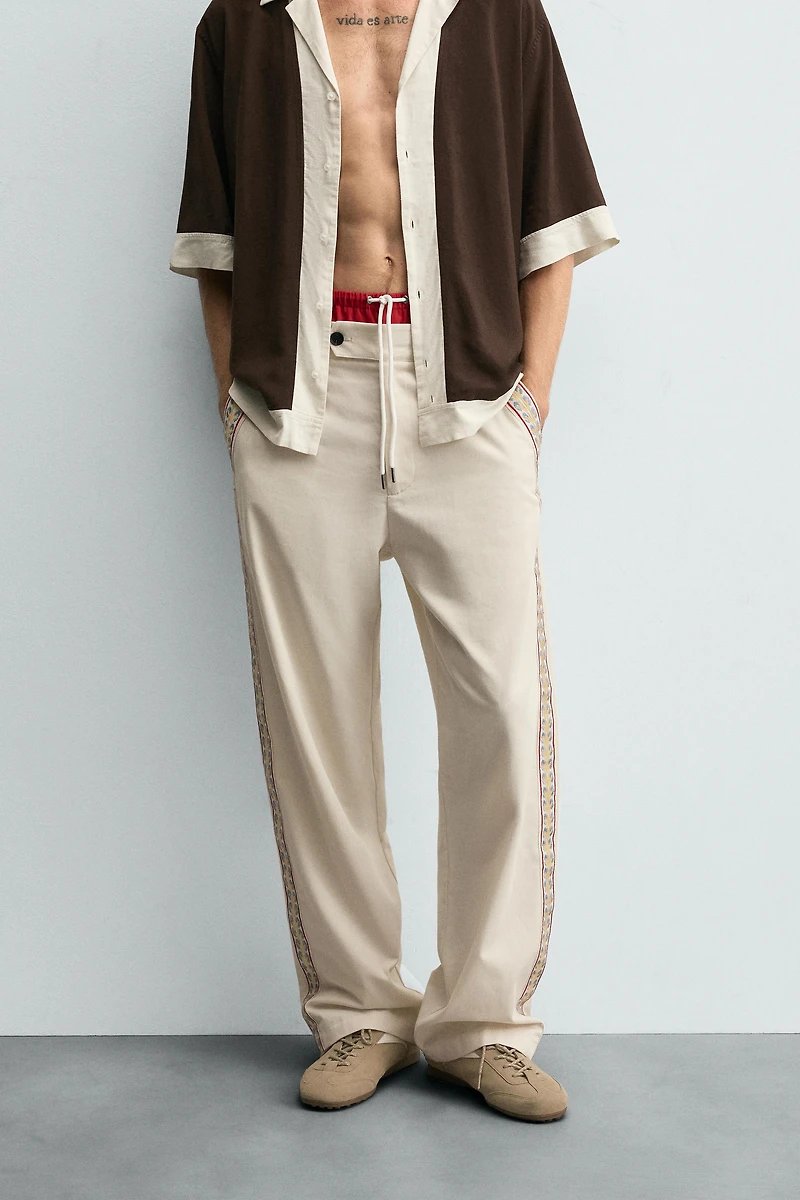 PANTALON BANDE BRODÉE