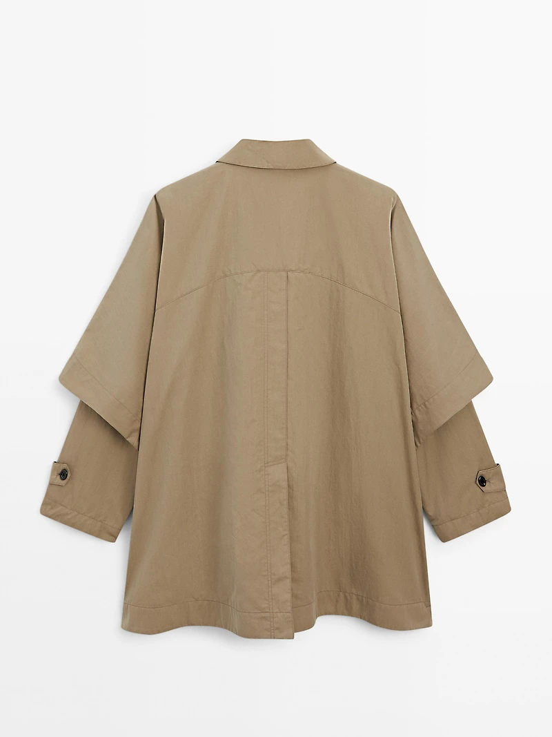 Cape trench coat with long sleeves
