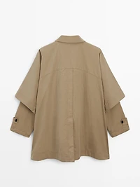 Cape trench coat with long sleeves