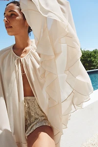 RUFFLED CAPE