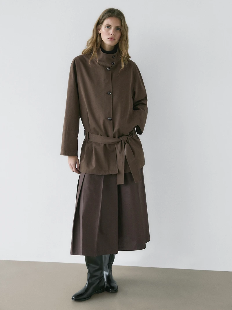 Mid-length trench coat with belt detail