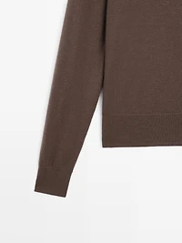 Pull à col montant boutonné