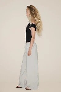 TOP COL BATEAU EN MAILLE UNIE