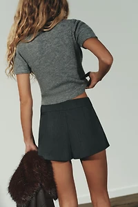 PULL EN MAILLE DOUCE À MANCHES COURTES