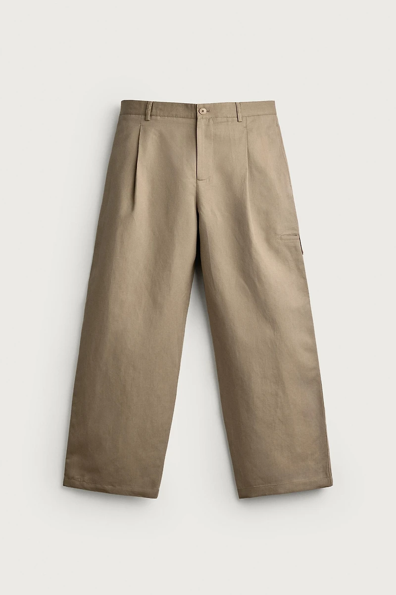 RELAXED FIT PLEATED PANTS