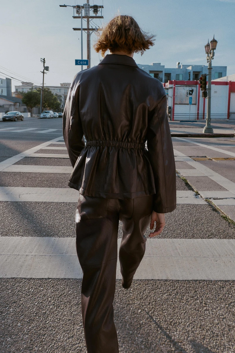 ELASTIC WAIST FAUX LEATHER JACKET