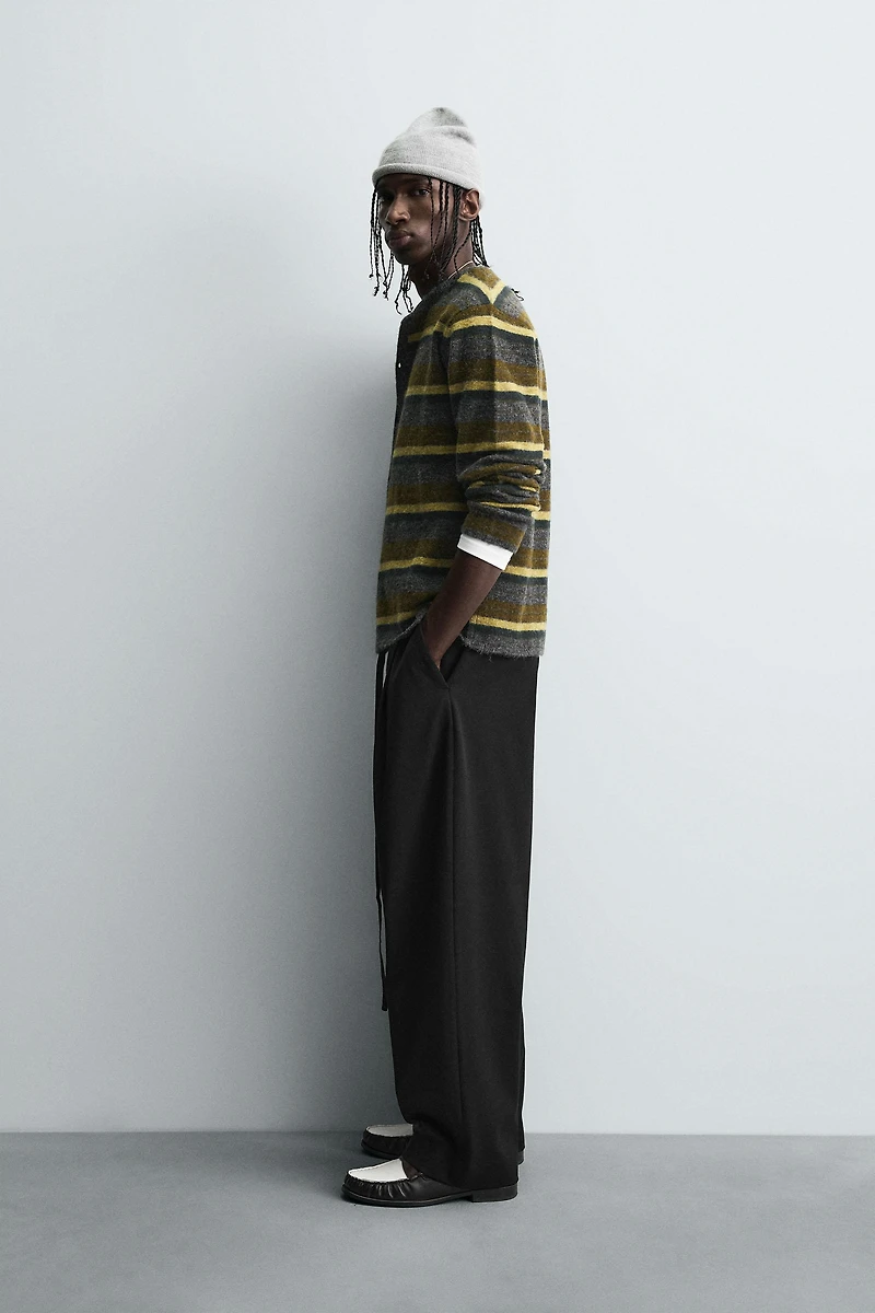 BALLOON PLEATED BELTED PANTS
