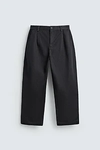 PANTALON CHINO EN DENIM À PLIS
