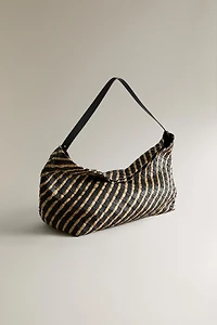 WOVEN LEATHER CLUTCH