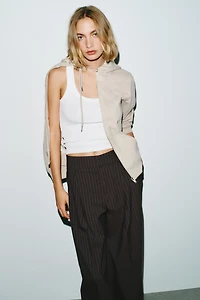 PINSTRIPE PANTS WITH PLEATS AND FLAPS