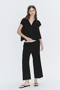 TIED ANKLE-LENGTH FLOWY PANTS