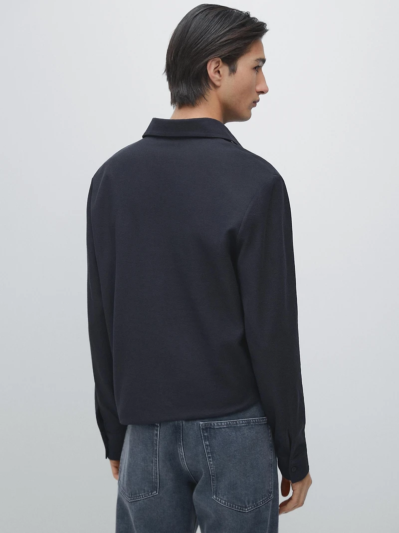 Polo texturé en piqué à manches longues