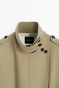Mid-length belted trench coat