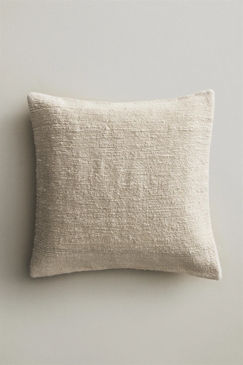 HOUSSE DE COUSSIN TRESSÉE