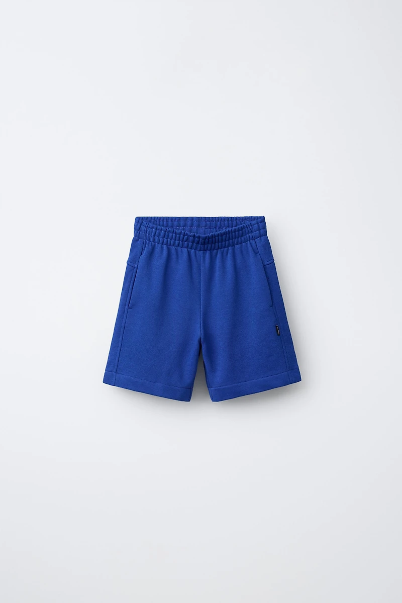 SHORT EN MOLLETON UNI