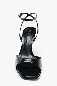 PATENT EFFECT HEELED SANDALS